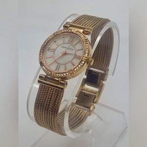 Anne Klein AK/2144RP premium crystal accent rose gold tone chain bracelet watch